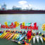 Activists with the Richmond-based Rich City Rays gather in front of a tanker carrying liquified natural gas in San Francisco Bay. Credit: Brooke Anderson