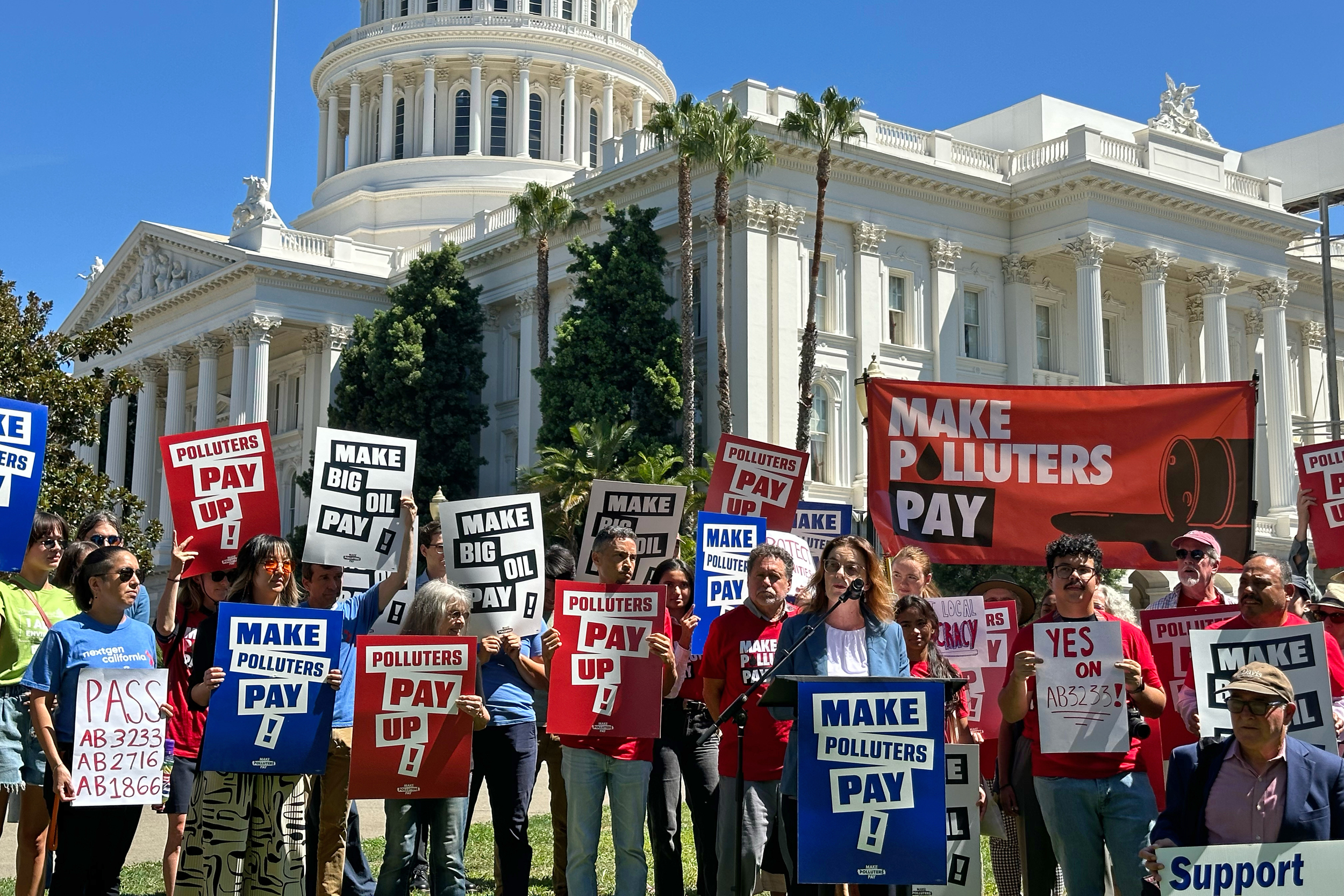 Assemblymember Dawn Addis (D-San Luis Obispo) talks about her bill to reaffirm local governments’ authority to regulate oil and gas production at a rally outside the California State Capitol in Sacramento on Monday. Credit: Last Chance Alliance