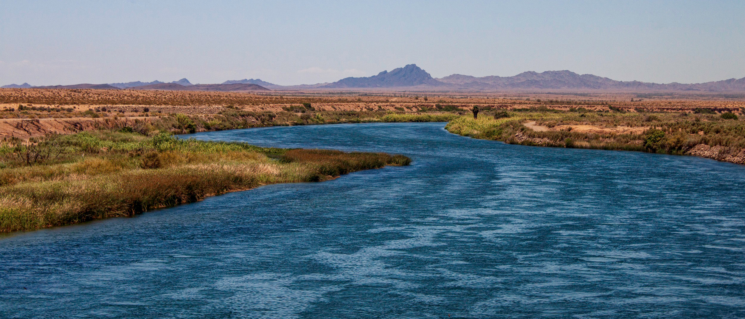 The Bureau of Indian Affairs, a federal agency, owns and operates the canal system that supplies the Colorado River Indian Tribes reservation with irrigation water. The system, which draws from the Colorado River, was developed piecemeal starting in the 1870s and needs repair. Credit: Brett Walton/Circle of Blue