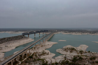 The U.S. 90 bridge crosses the Amistad Reservoir near Del Rio, Texas. Water deliveries from Mexico are stored at the reservoir, where water levels have dropped in recent months. Credit: Omar Ornelas