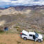 Melissa (left) and Steve Fry look out at the proposed mine site in the Galiuro Mountains outside Mammoth, Arizona, on March 14. Credit: Michael McKisson/Arizona Luminaria