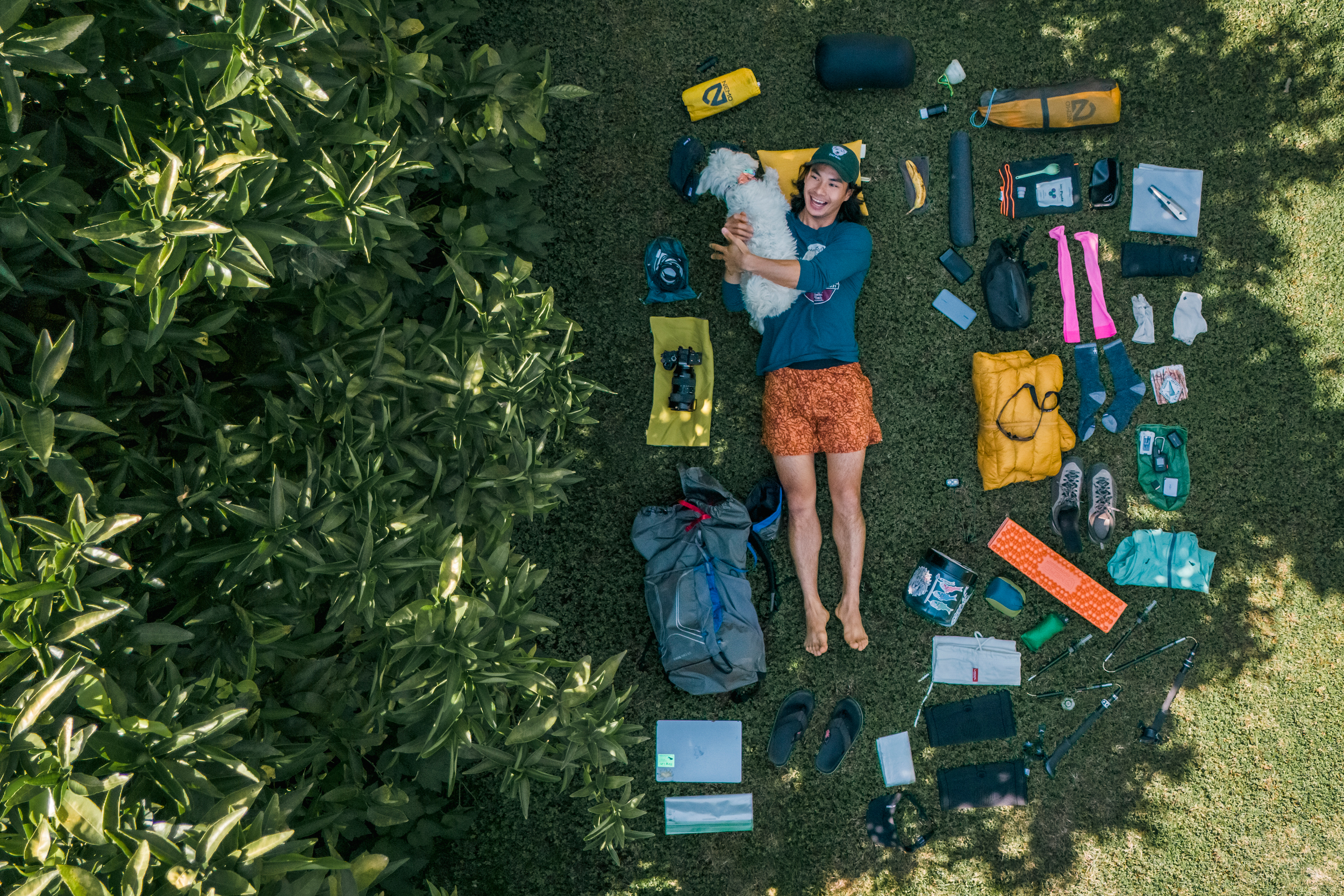 Bing Lin with everything he's bringing on his 500-mile Pacific Crest Trail hike and his dog, Darwin, who is not accompanying him on the hike. Credit: Taili Ni