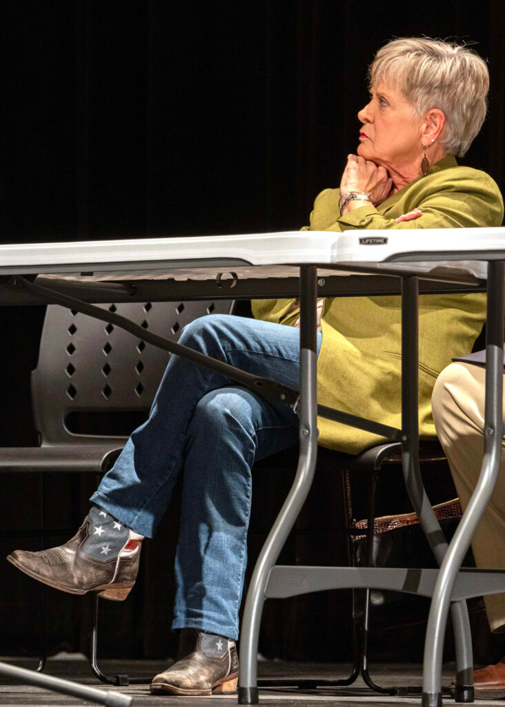 ASMC Director Kathy Loves sits before an audience of Oak Grove residents. Credit: Lee Hedgepeth/ Inside Climate News