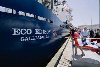 Jennifer Scalise, wife of U.S. House Majority Leader Steve Scalise, christens the ECO EDISON, the first American-built offshore wind service operations vessel on May 11 in New Orleans. The ECO EDISON will be the floating home base for offshore wind technicians at Ørsted's Northeast offshore wind farms. Credit: Tyler Kaufman/Ørsted