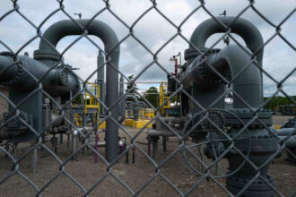 An Equitrans compressor station in Washington County. Last month, EQT announced it would acquire the pipeline operator to better compete “in a global era of natural gas.” Credit: Quinn Glabicki/PublicSource