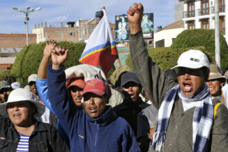 Aymara activists opposed to mining operations in Peru's southeastern Puno region organized on May 31, 2011 for a wave of protests against the Canada-based Bear Creek Mining Corporation plans to open a silver mine in the area. Credit: Aizar Raldes/AFP via Getty Images