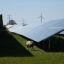 A sheep grazes among photovoltaic solar panels in the village of Hjolderup, Denmark. Credit: Sergei Gapon/AFP via Getty Images