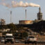 Vehicles pass the Phillips 66 Los Angeles Oil Refinery in Wilmington, California. Credit: Mario Tama/Getty Images