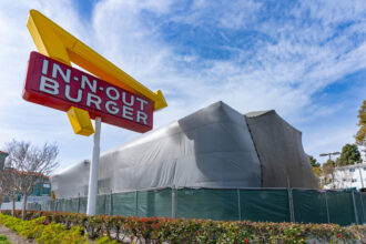 An In-N-Out Burger is closed and tented for termite fumigation on March 13 in Hollywood, Calif. Credit: AaronP/Bauer-Griffin via Getty Images