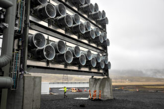 Direct air capture, a technique that removes carbon dioxide from the atmosphere, has been growing in popularity over the past decade, but critics worry that it is too energy-intensive. Credit: John Moore/Getty Images