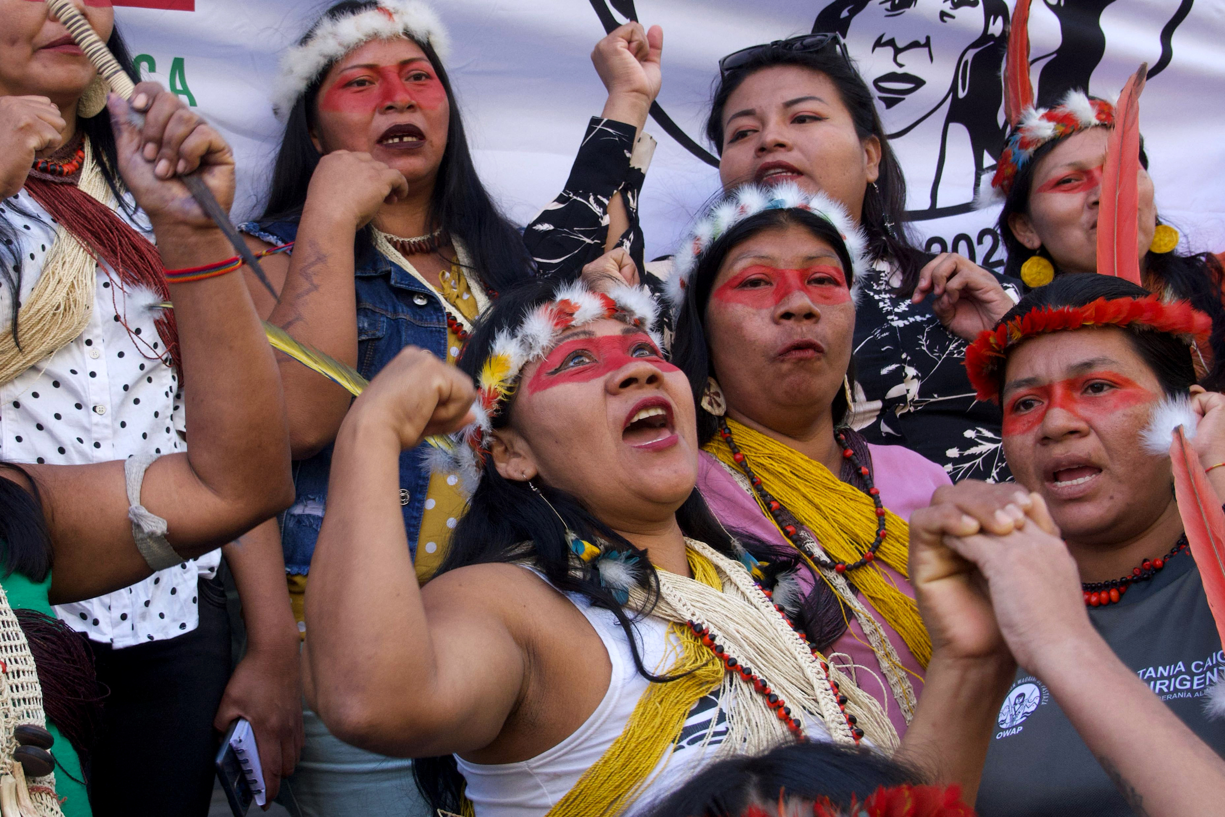 Waorani Indigenous people protest in front of Ecuador's Energy Ministry on Aug. 20 to demand that the government respect the results of a referendum requiring an end to oil drilling in the Yasuni National Park. Credit: Rodrigo Buendia/AFP via Getty Images