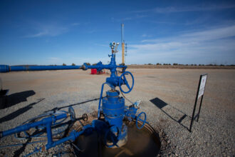 An injection well pumps oilfield wastewater into the ground in Coyle, Oklahoma. Credit: J Pat Carter/Getty Images