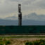 A drilling operation is surrounded by large noise dampening walls near Frederick, Colorado. Credit: Helen H. Richardson/The Denver Post via Getty Images