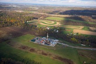 A fracking drilling pad operates in the Marcellus Shale formation near Robinson Township, Pa. Credit: Robert Nickelsberg/Getty Images