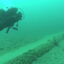 A National Wildlife Federation diver inspects Enbridge’s Line 5 pipeline at the bottom of the Straits of Mackinac. Credit: National Wildlife Federation video screenshot