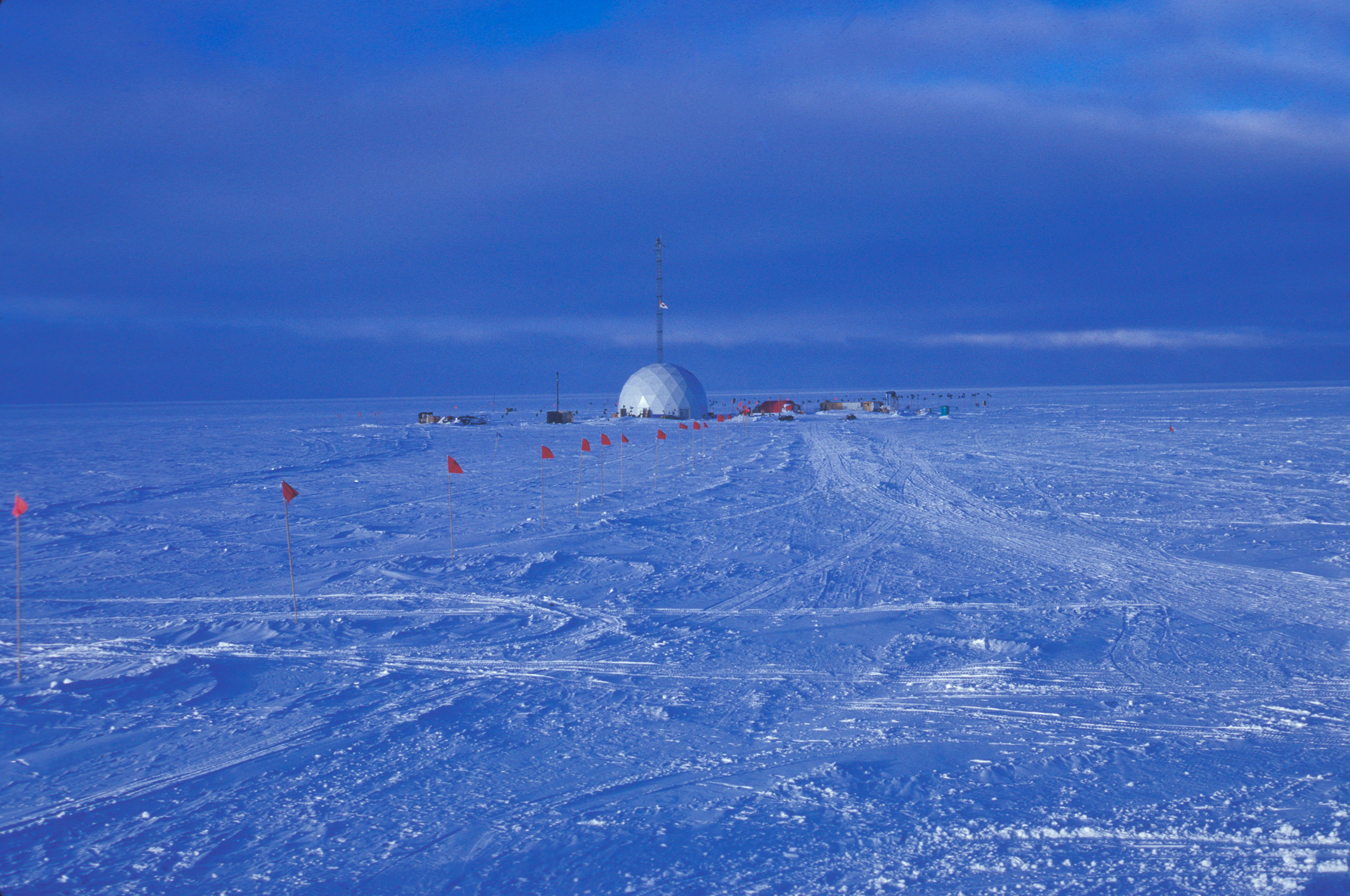 The drill dome and camp at the GISP2 site near the ice sheet summit in Greenland. Credit: Christine Massey