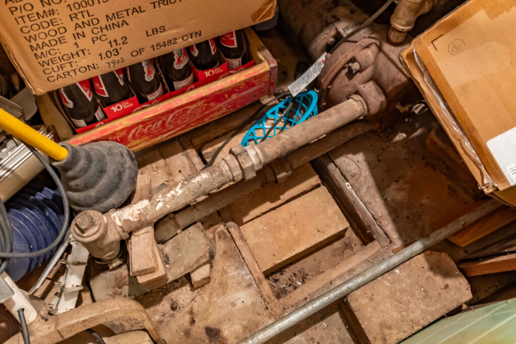 The water well in Clara Riley's storage room is covered by a few bricks. Credit: Lee Hedgepeth/Inside Climate News