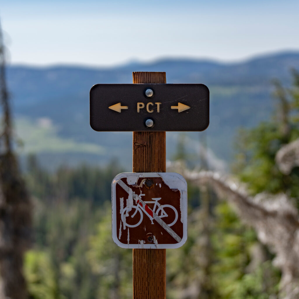 A PCT trail marker just south of Donner Ski Ranch in California. Credit: Bing Lin/Inside Climate News