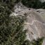 The Pacific Crest Trail footpath snakes along a mountain ridge south of Donner Summit, California, as a hiker climbs up the trail. Credit: Bing Lin/Inside Climate News