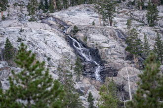 Glacial water streams down rocks in California’s Hoover Wilderness south of Leavitt Lake. Credit: Bing Lin/Inside Climate News