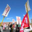 Participants in the "No Illegal Uranium Hauling" walk proceed along U.S. Route 89 on Friday in Cameron, Arizona. Credit: Noel Lyn Smith/Inside Climate News